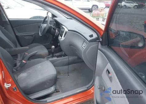 2009 Kia Rio Lx z USA, uszkodzony, nr VIN KNADE223296447085